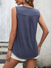 A soft heathered navy blue ivy lane lace scoop neck tank with a relaxed fit and gathered neckline detail