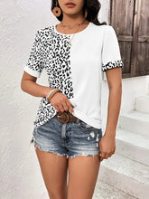 Ivy Lane Leopard Round Neck Top in leopard print with white accents and frayed hem