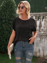 Ivy Lane Pocketed Round Neck Short Sleeve T-Shirt with Blue Jeans