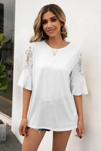 Woman in Ivy Lane ruffled cutout round neck half sleeve T-shirt