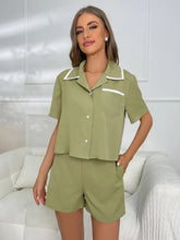 Olive green short sleeve pajama set with white trim on collar and pocket from ivy lane lounge collection