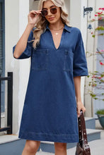 Blue denim dress with johnny collar, two front pockets, and half sleeves for casual wear
