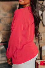 Jolly textured Christmas sweatshirt in vibrant coral red with ribbed vertical stripes and slightly stretchy material