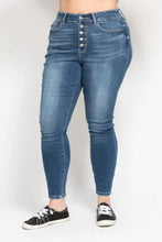 Blue high rise skinny jeans by judy blue featuring a button front closure with five silver buttons in denim material