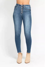 Judy Blue high rise skinny jeans in blue denim with a button fly featuring five silver buttons down the front