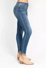 Judy Blue full size high rise skinny jeans in blue denim with slim fit and frayed hems for plus size