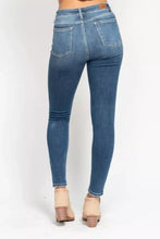Judy Blue full size high rise skinny jeans in blue denim with slim fit and frayed hems for plus size wear