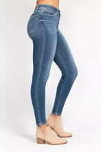 Judy Blue full size high rise skinny jeans in blue denim with slim fit and subtle fading plus size option