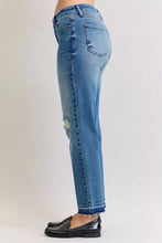 Juddy Blue plus size mid rise denim jeans in medium wash with distressed knees and frayed hems