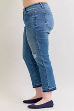 Mid rise cropped denim jeans with faded blue wash and knee distressing judy blue plus size style