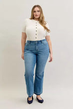 High-waisted blue denim slim bootcut judy blue jeans with mid rise and release hem in plus size