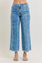 Judy Blue high rise ankle wide leg blue denim jeans with snakeskin pattern and frayed hems reflect core principle design