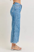 Judy Blue high rise ankle wide leg jeans in light-wash denim with snakeskin pattern and frayed hem core principle design