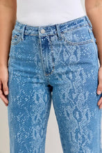 Judy Blue high rise ankle wide leg jeans in blue denim with a lighter blue and white snakeskin pattern core principle