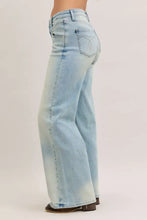Back view of judy blue light-wash denim column straight jeans with high waist and heart-shaped embroidery on pocket