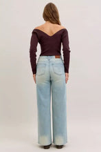 Light-wash judy blue high waist column straight jeans with wide-leg cut and classic back pockets shown from the back
