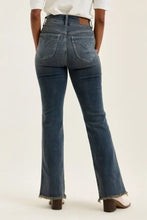 Back view of judy blue high waist dark-wash denim flare jeans with frayed hem and classic back pockets