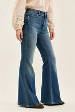 Blue denim high waist flare jeans with tummy control and classic stitching from judy blue jeans