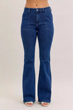 Judy Blue high waist flare jeans in blue denim with front patch pockets and a fitted high waist design