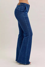 Blue denim judy blue high waist flare jeans with front patch pockets and brown leather waistband