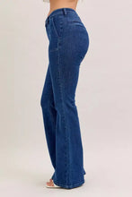 Blue denim high waist flare jeans by judy blue with front patch pockets and subtle vintage fading