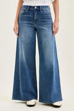 Judy Blue high waist palazzo jeans in blue denim with wide legs five-pocket design and subtle fading for a stylish look