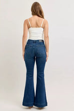 Blue denim judy blue high-waisted flare jeans with classic back pockets and front pockets visible from the back side