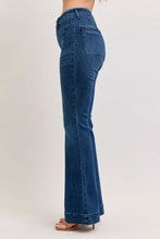 Dark blue denim judy blue high-waisted flare jeans with classic back pockets shown from the back side