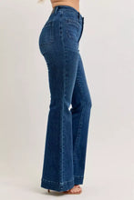 Dark blue denim judy blue high-waisted flare jeans with classic five-pocket design and rolled cuffs