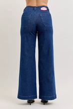 Back view of blue denim judy blue high-waisted retro wide jeans with classic patch pockets and twisted seams