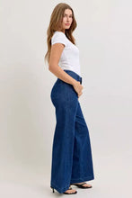 Judy Blue retro wide jeans in classic indigo denim with high waist, patch pockets, twisted seams, and visible stitching