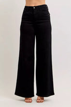 Black high-waisted wide leg denim pants with a sleek straight-cut silhouette by Judy Blue wide leg jeans