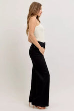 Black high-waisted wide leg jeans by judy blue featuring a relaxed fit and stylish wide leg design