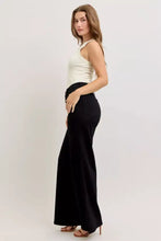 Black high-waisted wide leg jeans by judy blue featuring side pockets and a comfortable wide leg fit