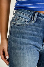 Mid-wash blue judy blue 90s straight jeans with classic five-pocket design and subtle fading for a worn-in look