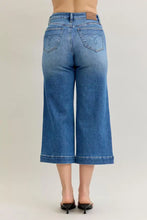 Blue denim culottes with a classic wash and subtle stitching details.