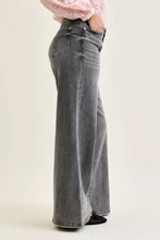 Gray wide-leg denim Judy Blue mid rise palazzo pants with faded wash and subtle stitching details shown from the back