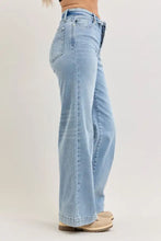 Light-wash judy blue mid rise retro wide leg jeans with classic five-pocket design and fold-over waistband