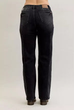 Back view of black denim judy blue mid rise straight leg jeans with subtle fading and western seam detail on pockets