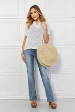Justin Taylor Beach white crochet top with straw rattan handbag