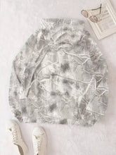 Kangaroo pocket long sleeve hoodie in gray and white camouflage pattern with relaxed fit and machine wash cold care instructions