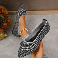 Black and white knit pointed toe ballet flats with stitching