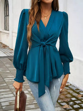 Teal satin knot front lantern sleeve blouse with puffed sleeves and tied waist for elegant occasions