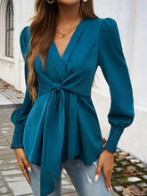 Teal satin knot front lantern sleeve blouse featuring long puff sleeves and a front tie detail for elegant wear