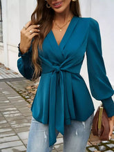 Teal satin knot front lantern sleeve blouse with long sleeves and tied waist for elegant wear