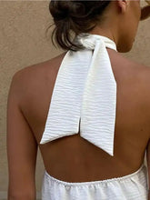 White crinkled fabric knotted halter neck cami with tie-back detail for stylish summer wear