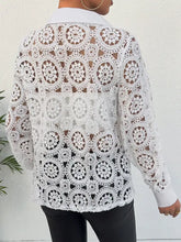 White lace long sleeve shirt with intricate circular patterns and solid collar featuring lace button design