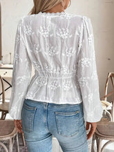 White lace detail balloon sleeve shirt with sheer fabric and floral embroidery on puffed sleeves