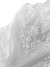 White lace balloon sleeve shirt featuring delicate floral embroidery and sheer fabric detailing