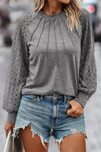 Women’s long-sleeve grey top with lantern sleeve lace and pleated front